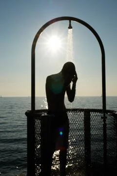 Shower ocean beach Stock Photos