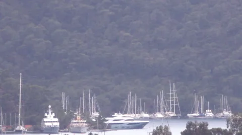 Shower, sky, mountains, forest and the yacht Marina Stock Footage 40647195