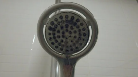 Shower water pours onto the camera from above Stock Footage 125464563