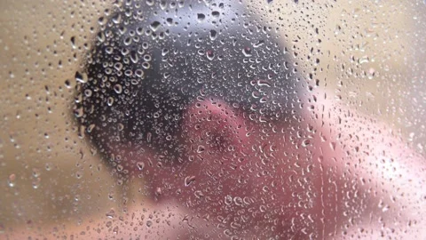Shower water pours on the man Stock Footage 145145308