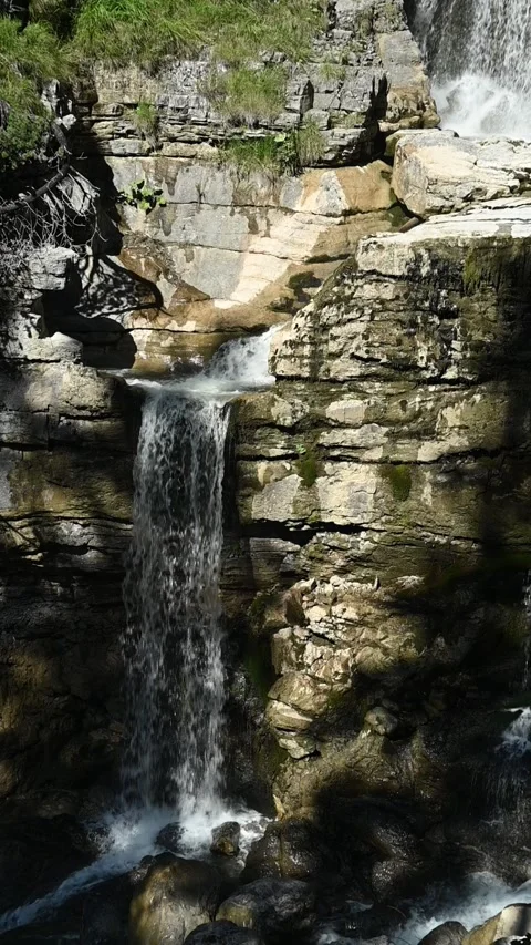 A shower like waterfall in summer, slow motion, vertical shot Video stock 260870438