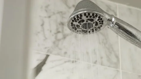 Showerhead Turns On and Off Stock Footage 130681306