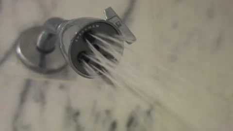 Showerhead Turns On and Off Stock Footage 130681553