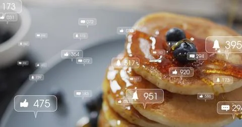 Showing 3-pancake stack with maple syrup on dark plate at cafe, 3 blueberries, Stock Photos