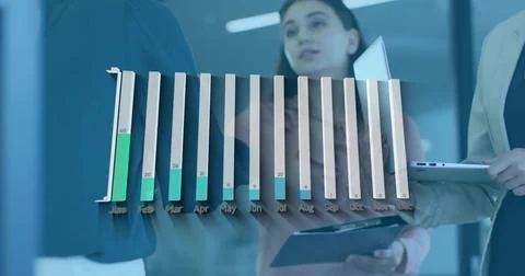 Showing 3D bar chart with green Jan Feb in glass room, blazer-clad team holdi Stock Photos