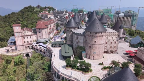 Showing aerial drone view of Ba Na Hills SunWorld castle complex in Vietnam Stock Footage 340029867
