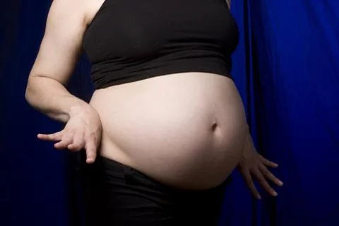 Showing off belly Stock Photos