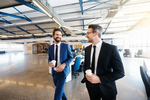 Showing a client around the office Stock Photos