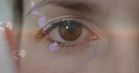 Showing close-up right eye displaying AR overlays in studio, with iris, lashes Stock Photos