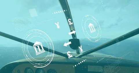 Showing cockpit panel and windshield struts flying over mountain peaks, with  Stock Photos
