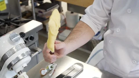 Showing completed dough from blender Stock Footage 307339943