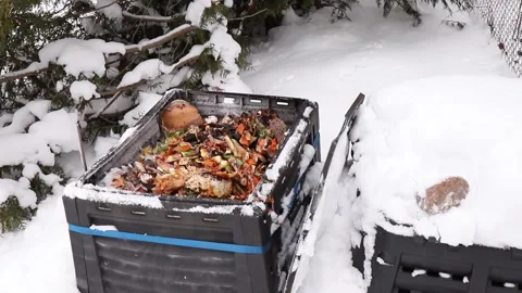 Showing compost bin with bio waste inside, outdoors in the winter. 스톡 동영상 262734228