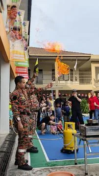 Showing the crowd how to handle any fire situation Photos