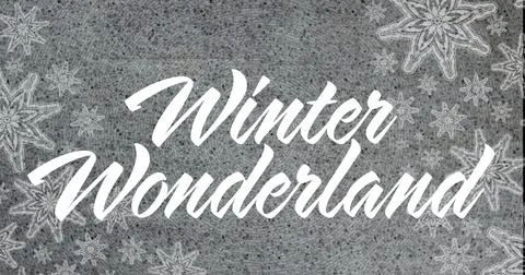 Showing cursive 'Winter Wonderland' text centering on gray knit circle with Illustrazione stock