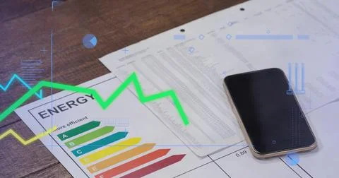 Showing efficiency chart and spreadsheet on wood desk, with smartphone and Stock Photos