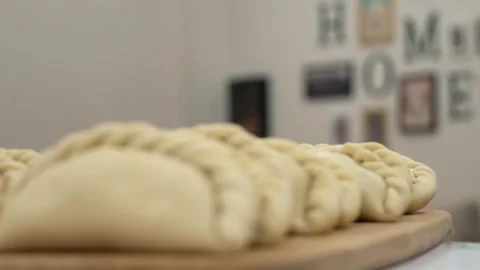 Showing empanadas 2 (Focus - B Roll) Stock Footage 205966829