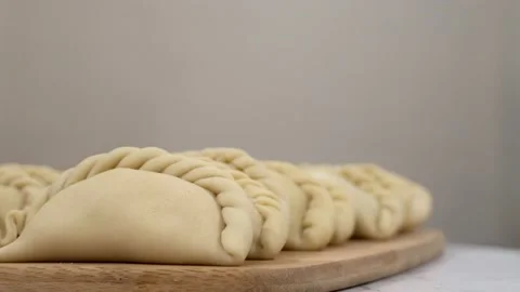 Showing empanadas 3 (Focus - B Roll) Stock Footage 205968236
