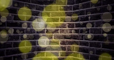 Showing exposed brick wall corner in studio space, with translucent yellow and Stock Photos