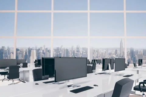 Showing flat design flat-screen monitor on white desk with keyboard and mouse Stock Photos