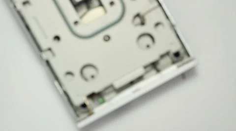 Showing how to use floppy disk drive Stock Footage 59862322