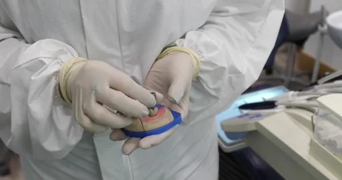 Showing the installation process of dental implants Stock Footage 148088610