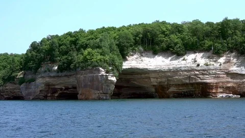 Showing the limestone cliffs of Pictured Rocks National Lakshore, munising MI Stock Footage 125054698