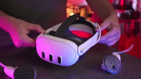 Showing the Meta Quest 3 VR headset, fun modern gaming set, 4K shot Vídeo Stock 299725464