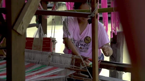 Showing old traditional way to do textile in Thailand 2015 Stock Footage 153448763