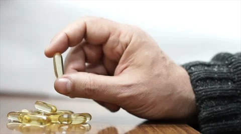 Showing pill Stock Footage 58953186