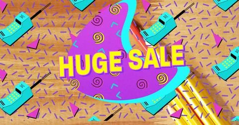 Showing purple shape featuring HUGE SALE on desk, with teal handset icons and Stock Photos