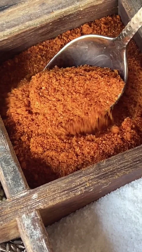Showing red chilli powder from a spice box. Stock Footage 286217508