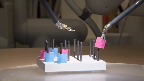 Showing robotic hands and its precise ability to handle objects Stock Footage 99051490