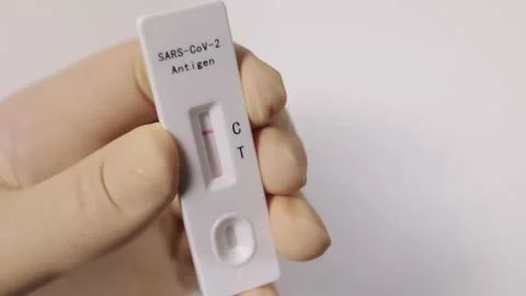 Showing a Sars Cov2 - Antigen Rapid Test with negative result - No Civid-19 Stock Footage 151124972