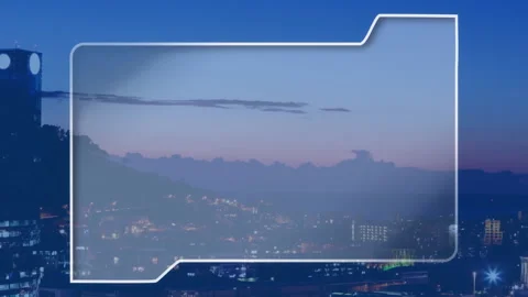 Showing semi-transparent folder UI overlay floating above dusk cityscape with Stock Footage 307437048