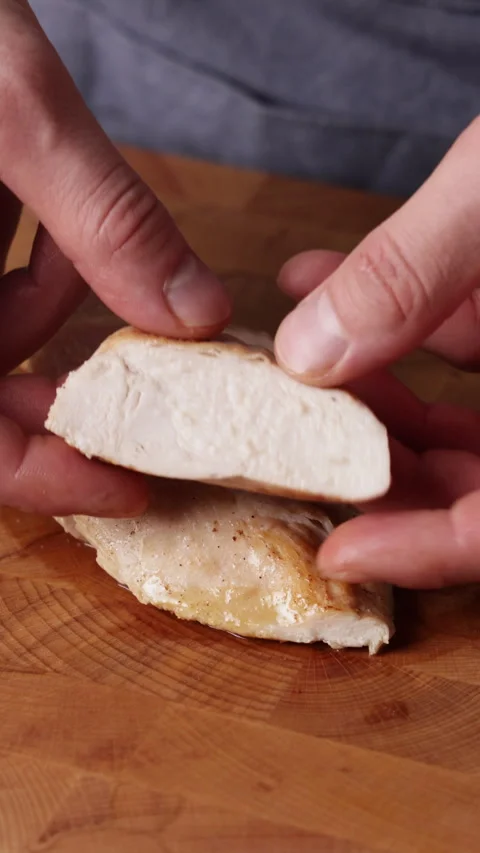 Showing Sliced Chicken Breast To Camera Front View Close Up 스톡 동영상 336205546
