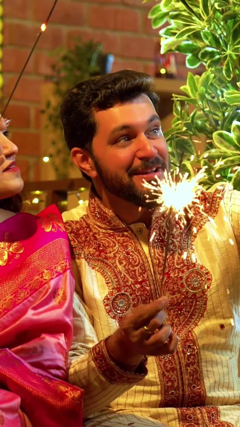 Showing Sparklers on Video Call While Sitting Together During Diwali Stock Footage 342381357