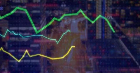 Showing three colored line graphs fluctuating over grid on screen, with data  Stock Photos