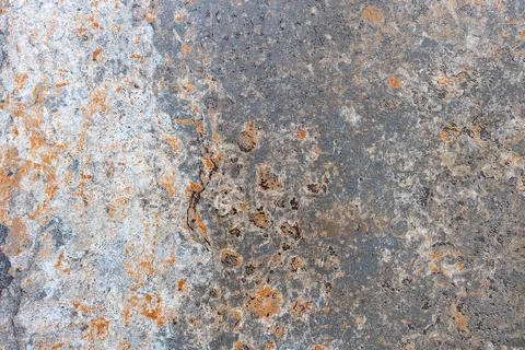 Showing traces of rust over old paint on the surface of a metal sheet. Stock Photos