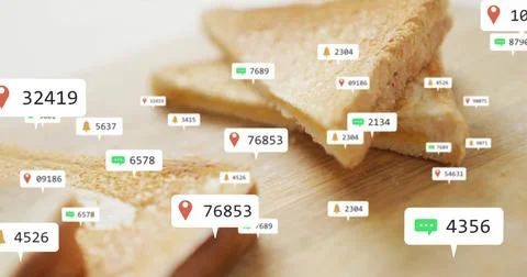 Showing triangular toast slices on board at counter, with floating social media Stock Photos