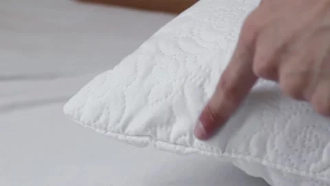 Showing the white pillow Stock Footage 156069661