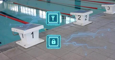 Showing white starting platform labeled 1 sitting at pool deck beside red div Stock Photos