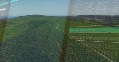 Showing windowpane overlay projecting rolling green hills at office workspace, 스톡 사진