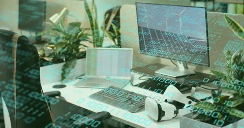 Showing workstation displaying code overlay on screen at office, laptop VR 스톡 사진