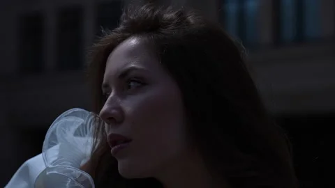 Shown in various closeup shots, touching her hair and wearing a white hat Vidéo 269033955