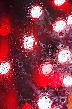 Shows an abstract texture of red with white spots and bubbles. Stock Photos