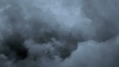 Shows a heavy lightning storm background with dramatic dark clouds and lightning Stock Footage 160664936