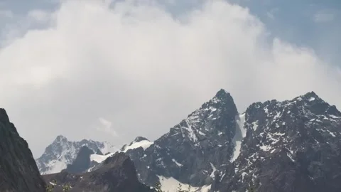 Shows a mountain range, potentially Monviso or Ala-Archa, characterized by rugge Video stock 306566987