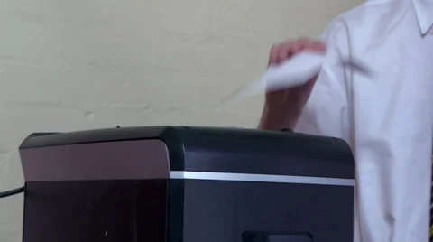 Shreader shredding paper Stock Footage 30398696