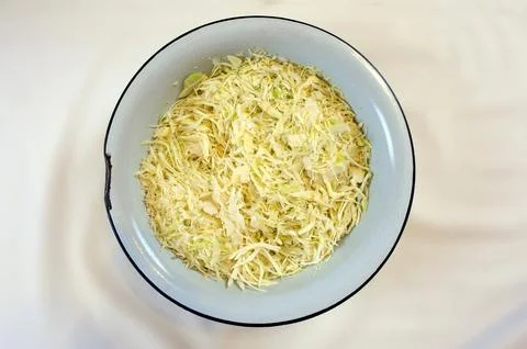 Shredded cabbage on an isolated background. Stock Photos
