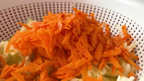 Shredded Carrots And Cabbage In Colander Stock Footage 331609771